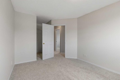 86 Saddlemont Close Ne, Calgary, AB - Indoor Photo Showing Other Room
