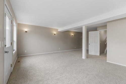 86 Saddlemont Close Ne, Calgary, AB - Indoor Photo Showing Other Room