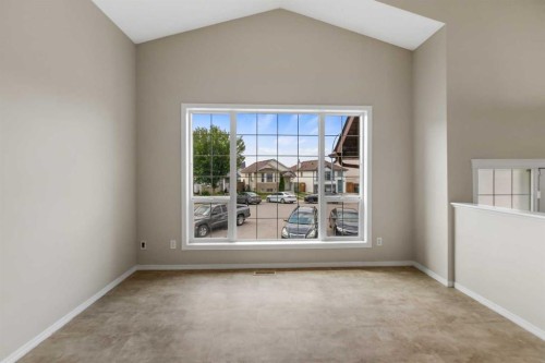 86 Saddlemont Close Ne, Calgary, AB - Indoor Photo Showing Other Room