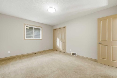 137 Evanscove Circle Nw, Calgary, AB - Indoor Photo Showing Other Room