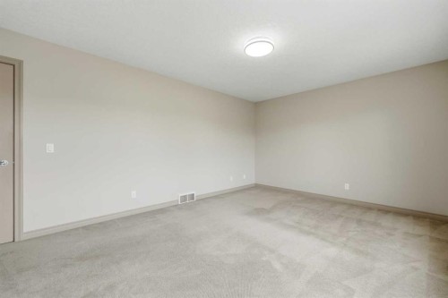 137 Evanscove Circle Nw, Calgary, AB - Indoor Photo Showing Other Room