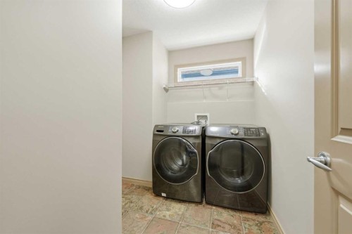 137 Evanscove Circle Nw, Calgary, AB - Indoor Photo Showing Laundry Room