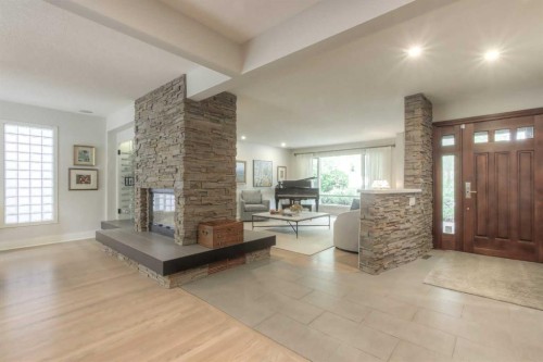 1702 24 Street Sw, Calgary, AB - Indoor Photo Showing Living Room With Fireplace