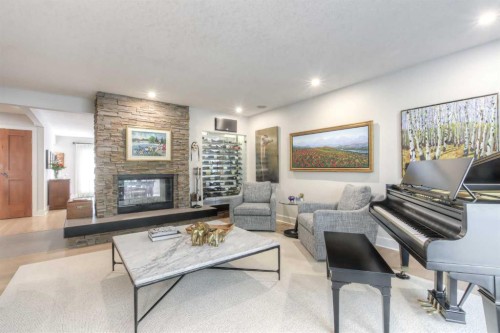 1702 24 Street Sw, Calgary, AB - Indoor Photo Showing Living Room With Fireplace
