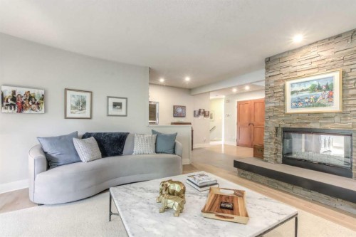 1702 24 Street Sw, Calgary, AB - Indoor Photo Showing Living Room With Fireplace