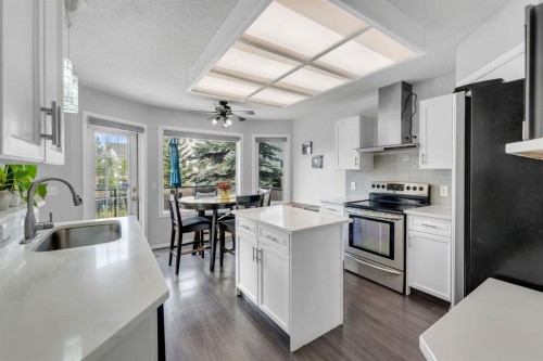 11 Arbour Summit Close Nw, Calgary, AB - Indoor Photo Showing Kitchen With Upgraded Kitchen