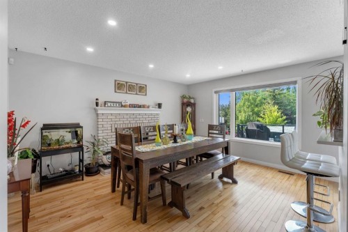 11 Arbour Summit Close Nw, Calgary, AB - Indoor With Fireplace