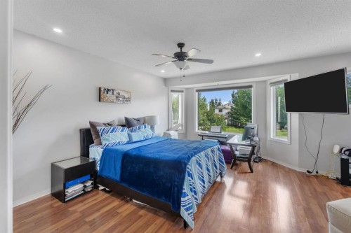 11 Arbour Summit Close Nw, Calgary, AB - Indoor Photo Showing Bedroom