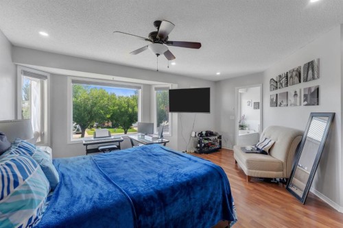 11 Arbour Summit Close Nw, Calgary, AB - Indoor Photo Showing Bedroom