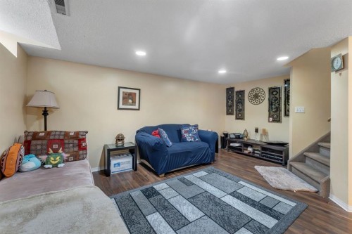 11 Arbour Summit Close Nw, Calgary, AB - Indoor Photo Showing Basement