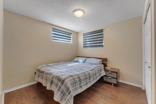11 Arbour Summit Close Nw, Calgary, AB - Indoor Photo Showing Bedroom