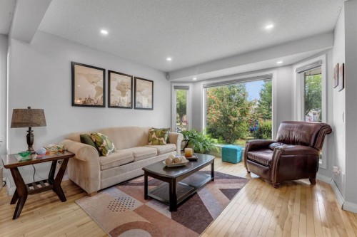 11 Arbour Summit Close Nw, Calgary, AB - Indoor Photo Showing Living Room