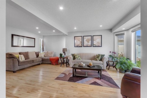 11 Arbour Summit Close Nw, Calgary, AB - Indoor Photo Showing Living Room