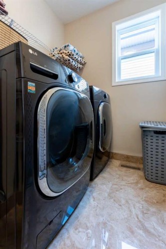 232 Walden Heights Se, Calgary, AB - Indoor Photo Showing Laundry Room