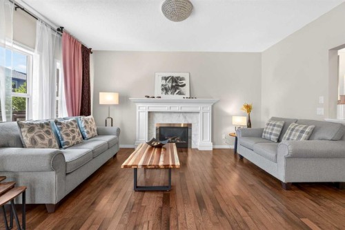 232 Walden Heights Se, Calgary, AB - Indoor Photo Showing Living Room With Fireplace
