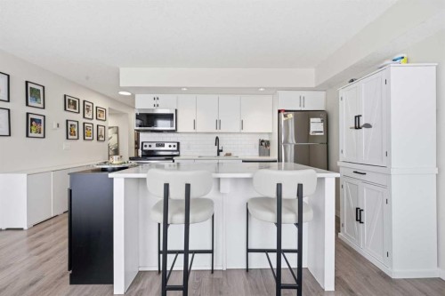 404-1920 11 Avenue Sw, Calgary, AB - Indoor Photo Showing Kitchen With Upgraded Kitchen