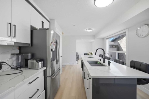 7916 Martha'S Haven Park Ne, Calgary, AB - Indoor Photo Showing Kitchen With Double Sink With Upgraded Kitchen