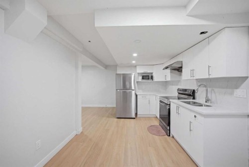 7916 Martha'S Haven Park Ne, Calgary, AB - Indoor Photo Showing Kitchen With Double Sink