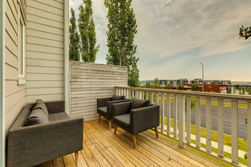 206 Nolanfield Villas Nw, Calgary, AB - Outdoor With Deck Patio Veranda With Exterior