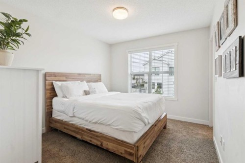 206 Nolanfield Villas Nw, Calgary, AB - Indoor Photo Showing Bedroom