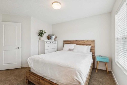 206 Nolanfield Villas Nw, Calgary, AB - Indoor Photo Showing Bedroom