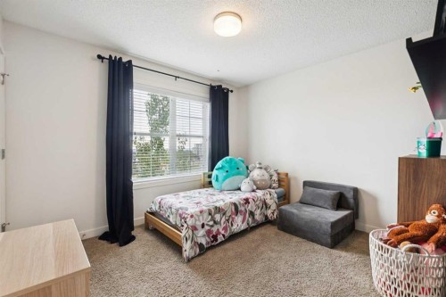 206 Nolanfield Villas Nw, Calgary, AB - Indoor Photo Showing Bedroom