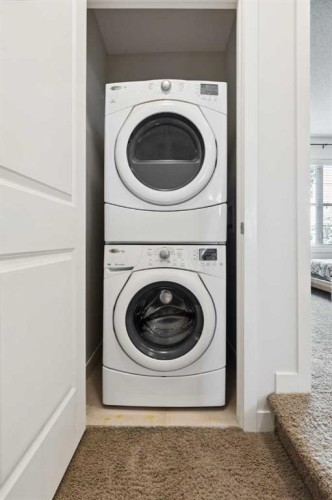 206 Nolanfield Villas Nw, Calgary, AB - Indoor Photo Showing Laundry Room