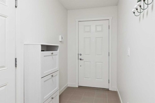 206 Nolanfield Villas Nw, Calgary, AB - Indoor Photo Showing Other Room