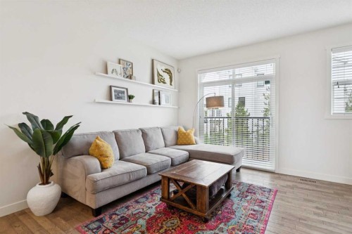 206 Nolanfield Villas Nw, Calgary, AB - Indoor Photo Showing Living Room