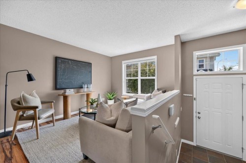 3146 New Brighton Gardens Se, Calgary, AB - Indoor Photo Showing Living Room