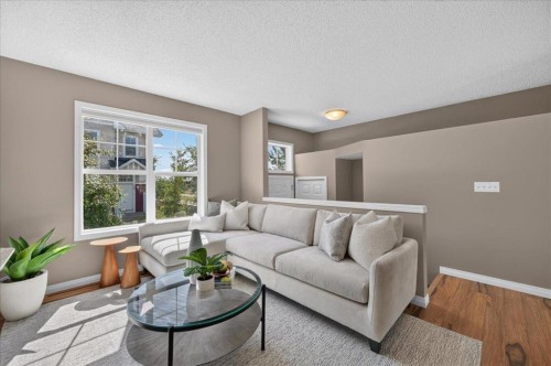 3146 New Brighton Gardens Se, Calgary, AB - Indoor Photo Showing Living Room