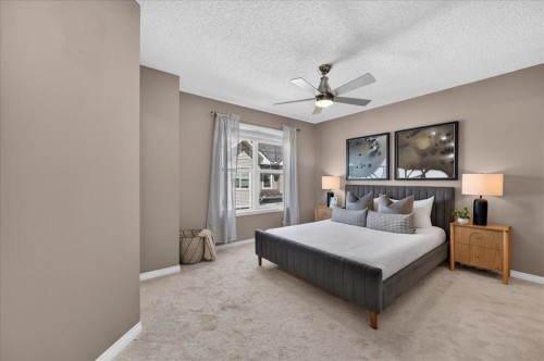 3146 New Brighton Gardens Se, Calgary, AB - Indoor Photo Showing Bedroom