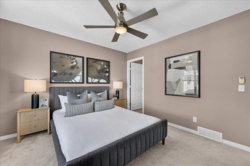 3146 New Brighton Gardens Se, Calgary, AB - Indoor Photo Showing Bedroom