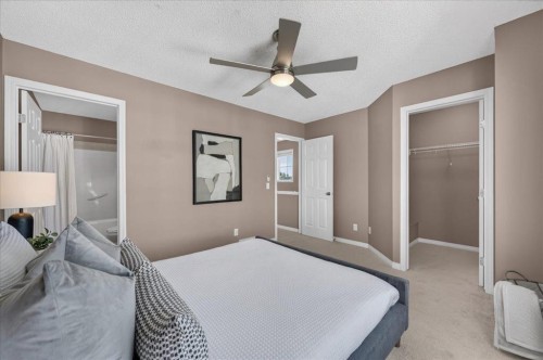 3146 New Brighton Gardens Se, Calgary, AB - Indoor Photo Showing Bedroom