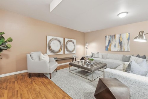 42 Prestwick Pond Terrace Se, Calgary, AB - Indoor Photo Showing Living Room