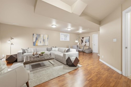 42 Prestwick Pond Terrace Se, Calgary, AB - Indoor Photo Showing Living Room