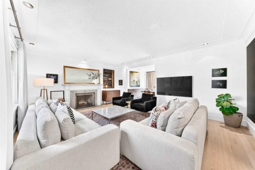 3223 2 Street Sw, Calgary, AB - Indoor Photo Showing Living Room With Fireplace