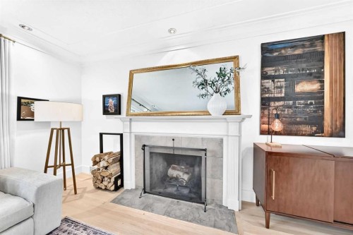 3223 2 Street Sw, Calgary, AB - Indoor Photo Showing Living Room With Fireplace