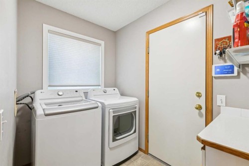 124 Schubert Hill Nw, Calgary, AB - Indoor Photo Showing Laundry Room