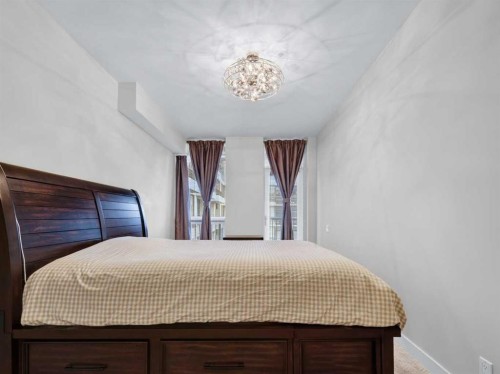511-222 Riverfront Avenue Sw, Calgary, AB - Indoor Photo Showing Bedroom