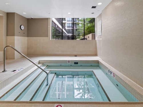 511-222 Riverfront Avenue Sw, Calgary, AB - Indoor Photo Showing Other Room With In Ground Pool
