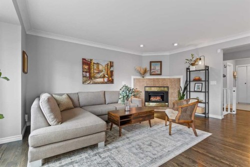 2031 2 Avenue Nw, Calgary, AB - Indoor Photo Showing Living Room With Fireplace