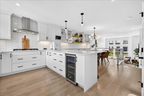 199 Magnolia Way Se, Calgary, AB - Indoor Photo Showing Kitchen With Upgraded Kitchen