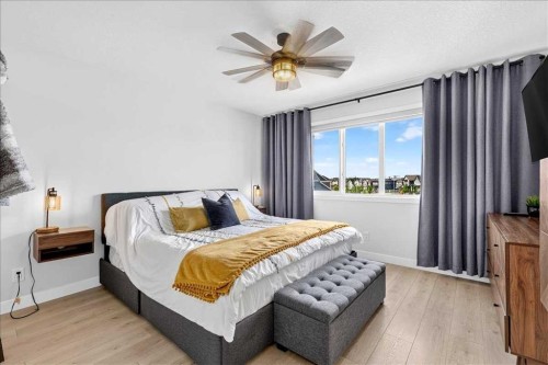 199 Magnolia Way Se, Calgary, AB - Indoor Photo Showing Bedroom