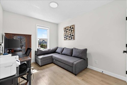 199 Magnolia Way Se, Calgary, AB - Indoor Photo Showing Living Room