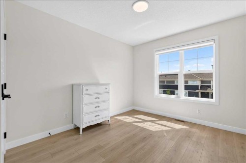 199 Magnolia Way Se, Calgary, AB - Indoor Photo Showing Other Room
