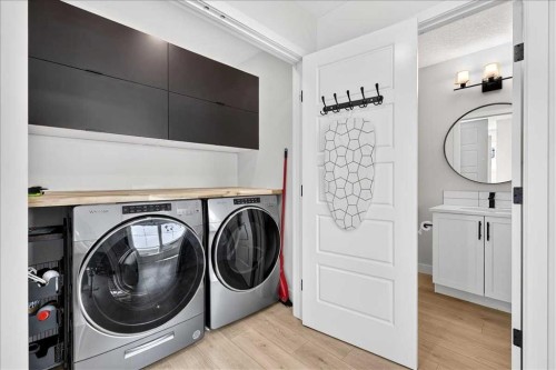 199 Magnolia Way Se, Calgary, AB - Indoor Photo Showing Laundry Room