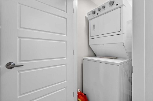 199 Magnolia Way Se, Calgary, AB - Indoor Photo Showing Laundry Room