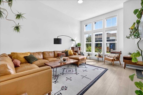 199 Magnolia Way Se, Calgary, AB - Indoor Photo Showing Living Room