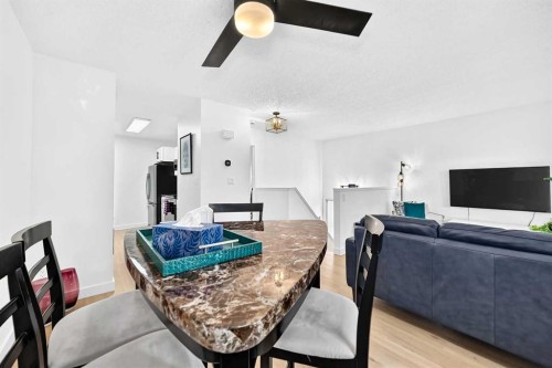 D-109 Stanley Avenue, Okotoks, AB - Indoor Photo Showing Dining Room